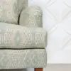 Sage Geometric Upholstered Armchair with Brass-Caster Legs