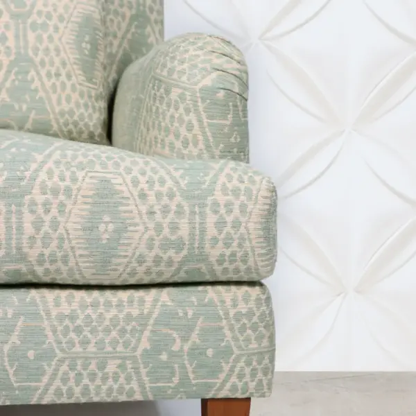 Sage Geometric Upholstered Armchair with Brass-Caster Legs