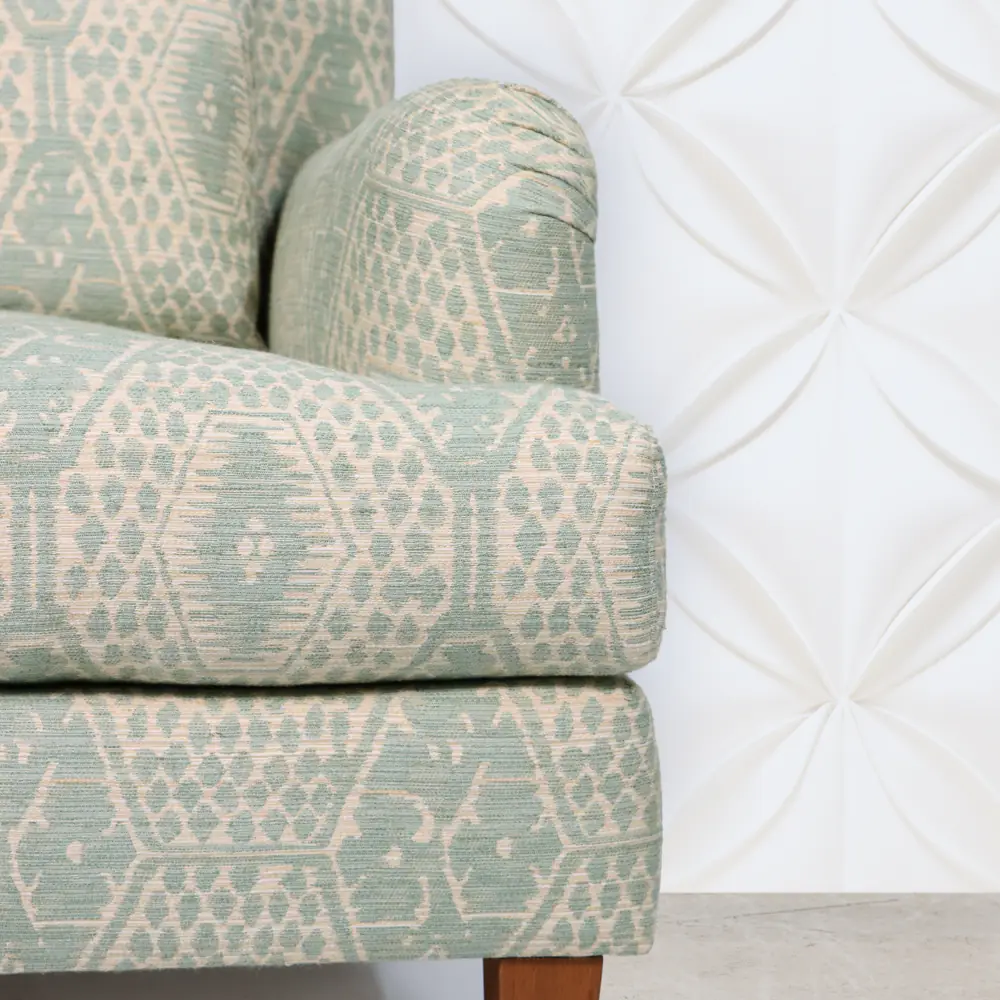 Sage Geometric Upholstered Armchair with Brass-Caster Legs