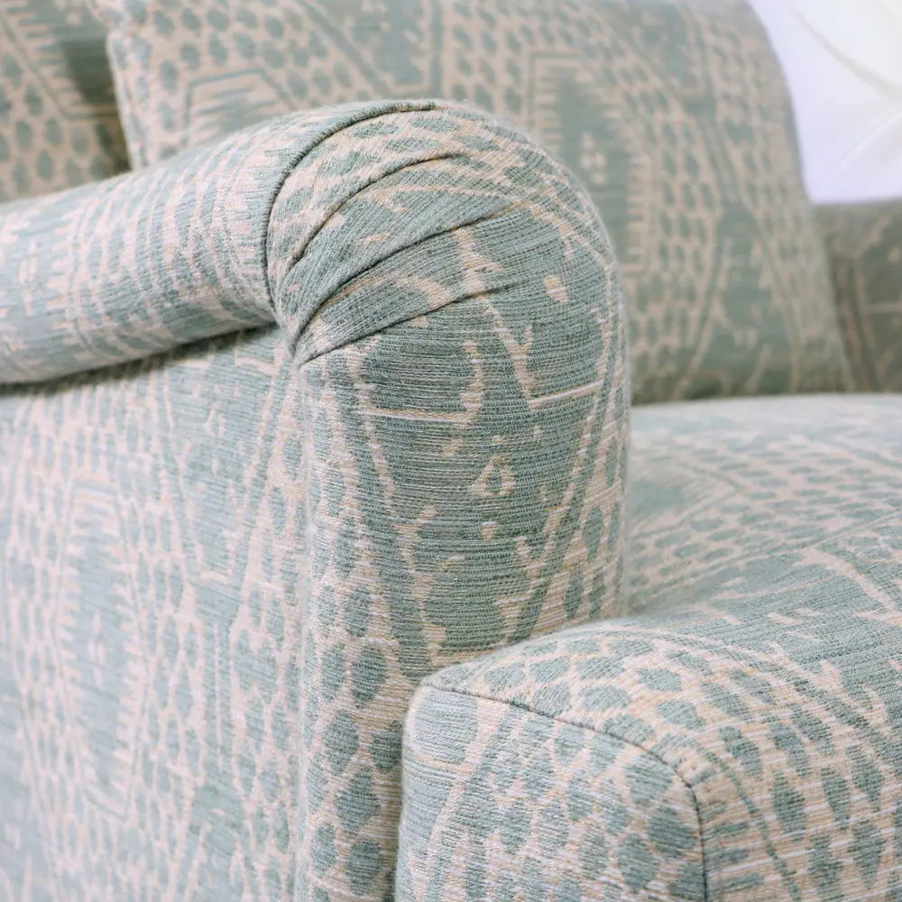 Sage Geometric Upholstered Armchair with Brass-Caster Legs