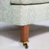 Sage Geometric Upholstered Armchair with Brass-Caster Legs