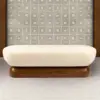 Eden Bouclé Ottoman with Walnut Plinth Base