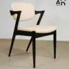 Aria Sculpted Arm Dining Chair in Black Wood & Cream Boucle
