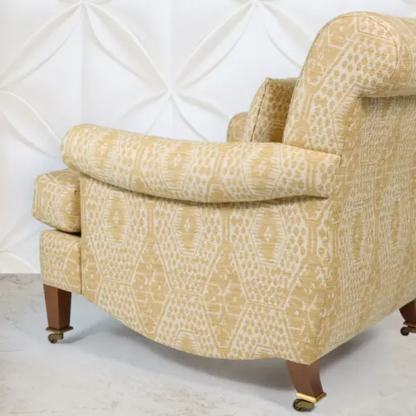 Honey Ikat Rolled‑Arm Lounge Chair with Brass Casters