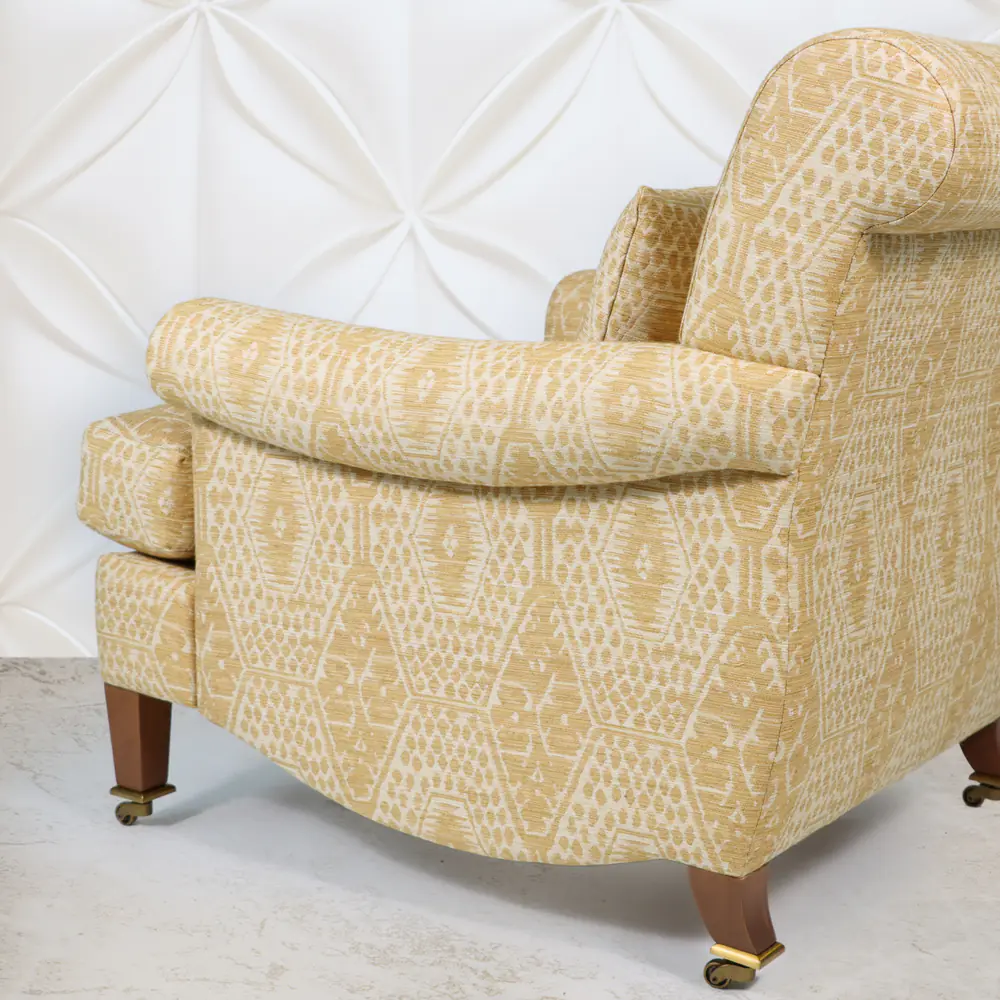 Honey Ikat Rolled‑Arm Lounge Chair with Brass Casters