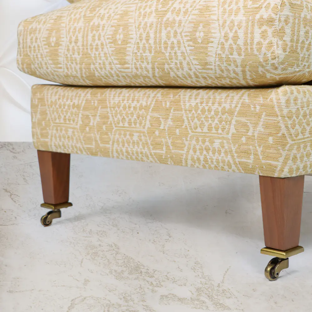 Honey Ikat Rolled‑Arm Lounge Chair with Brass Casters