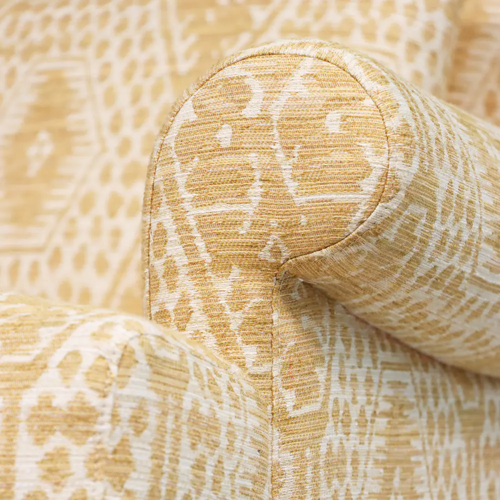 Honey Ikat Rolled‑Arm Lounge Chair with Brass Casters