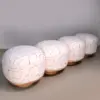 Pebble Stitch Pouf Stool with Wood Plinth Base