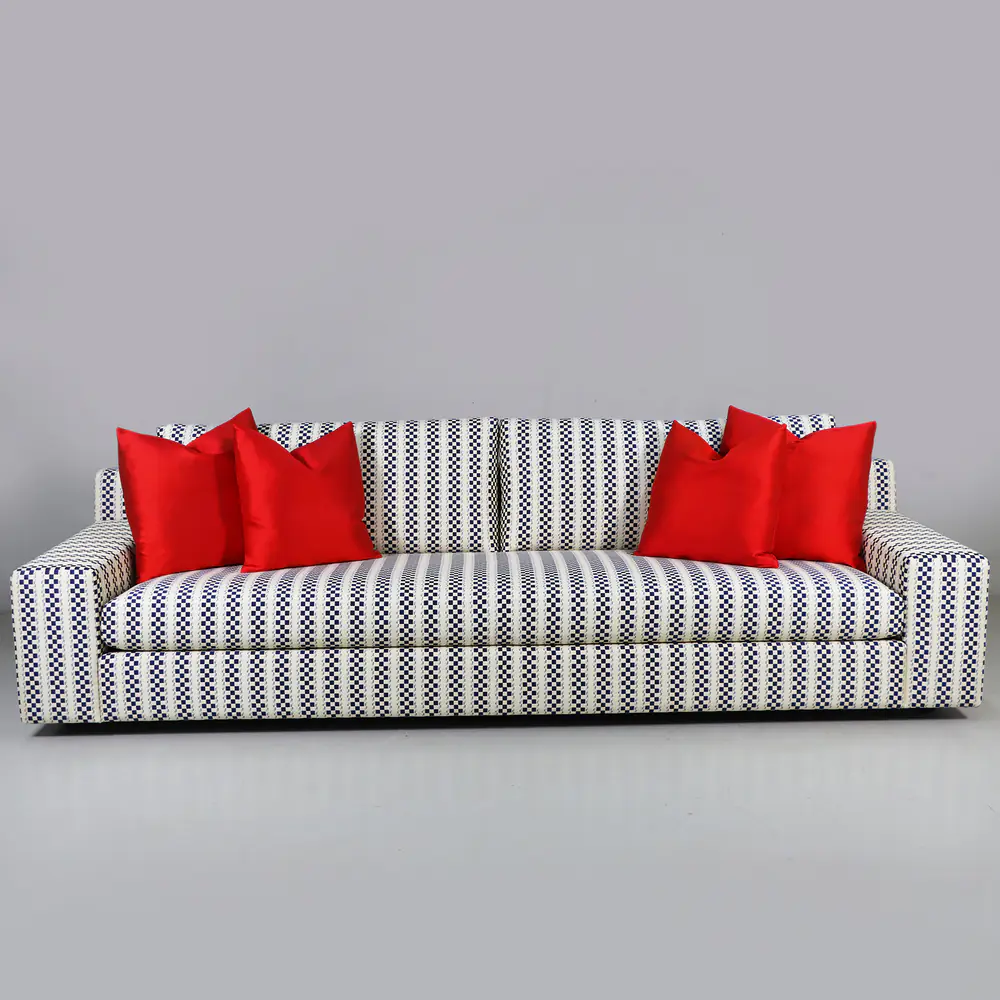 Navy Checkered Track-Arm Sofa with Red Accent Cushions