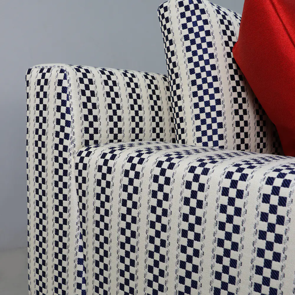 Navy Checkered Track-Arm Sofa with Red Accent Cushions